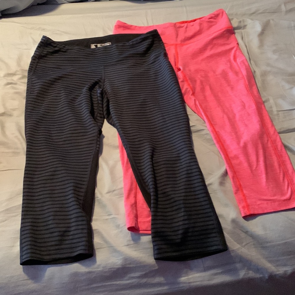 Lot of two New balance dry capris. Pink has one stain. Pictured.